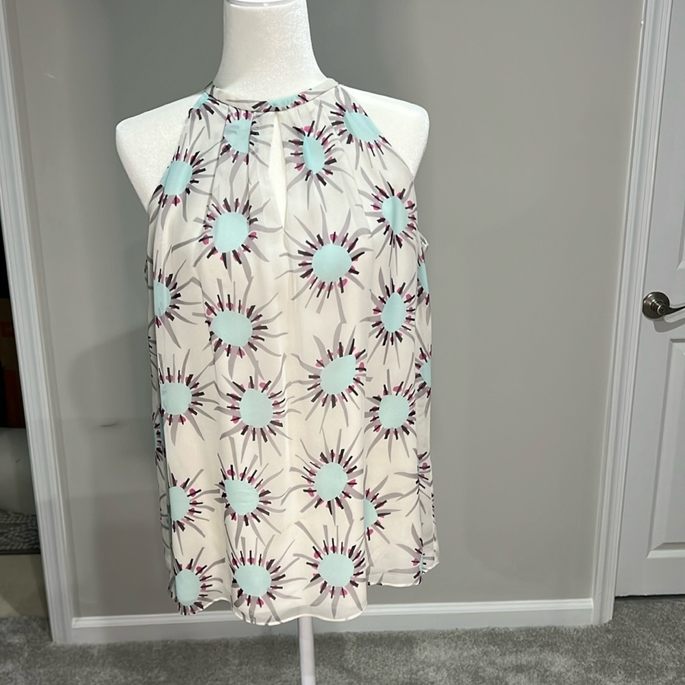 DVF silk flowing tank top size 8 with small cut outs in the front and back